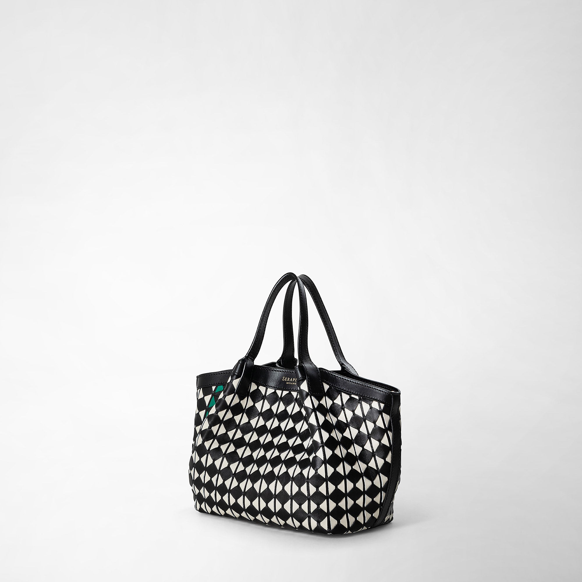 Black and white Mini Museum tote bag with polka dots